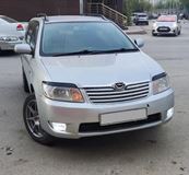Реснички на фары для Toyota Corolla (правый руль) NZE121 2рестайлинг 2004-2006